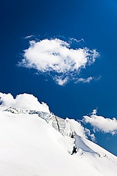 High mountain glacier, vertical frame, Switzerland.