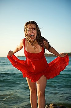 Woman screaming on the beach