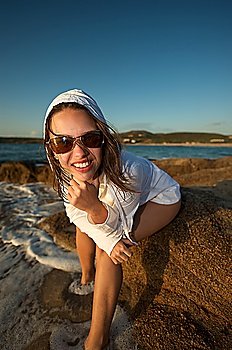 Beauty girl posing on the beach