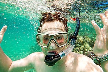 boys in the sea, snorkeling the Red sea