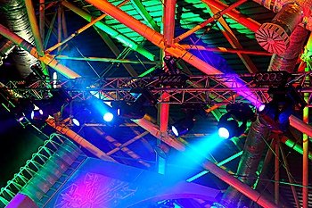 lighting equipment  at concert - colored spotlights on ceiling