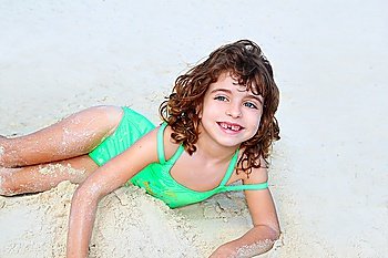 beach sandy girl smiling little children green swimming suit
