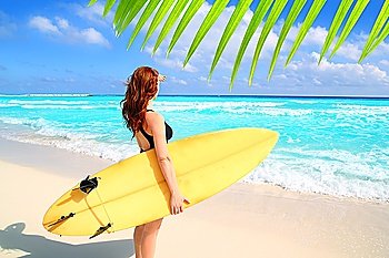 surfer woman side view tropical sea looking waves Caribbean sea