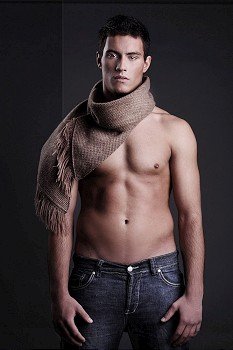 Handsome man posing with scarf