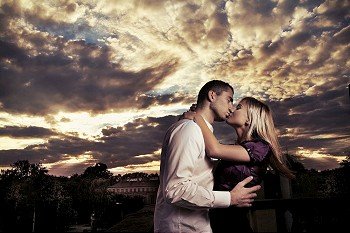 Romantic photo of a kissing couple