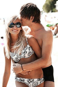 Young attractive couple on a beach