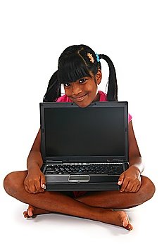 Beautiful 10 year old Indian child with laptop.