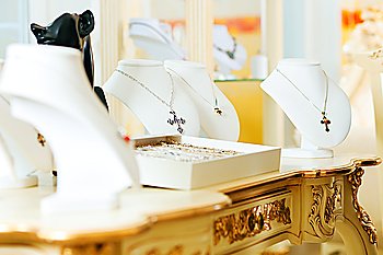 Display at a jeweller with necklace and rings