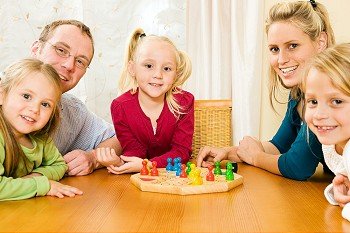 Family playing boardgame