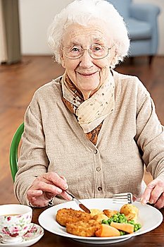 Senior Woman Enjoying Meal