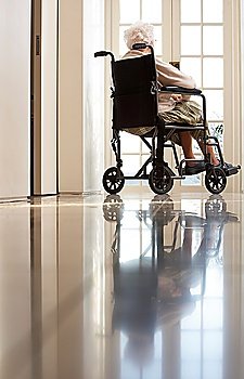 Disabled Senior Woman Sitting In Wheelchair