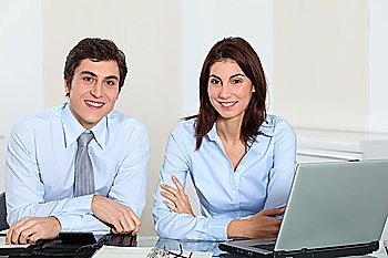 Business man and woman in an office
