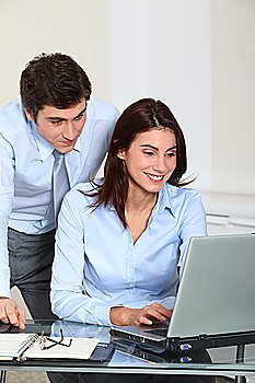 Business man and woman in an office