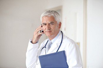 Senior doctor on the phone