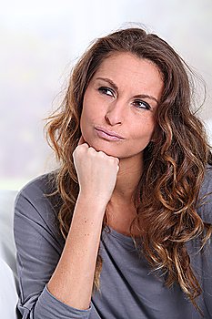 Portrait of woman with doubtful look