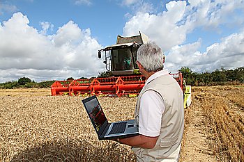 Farmer using a laptop