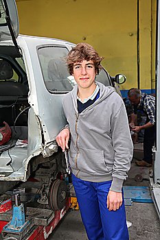 Portrait of teenager in mechanics apprenticeship