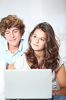 Teenagers with laptop computer