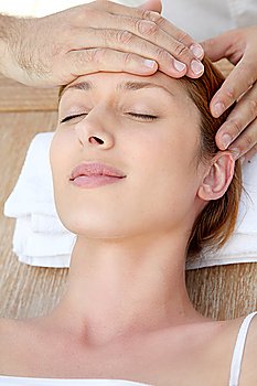 Beautiful woman having a head massage
