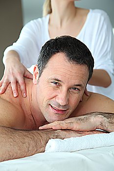 Handsome man having a massage