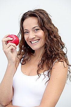 Closeup of woman eating a red apple
