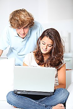 Teenagers with laptop computer