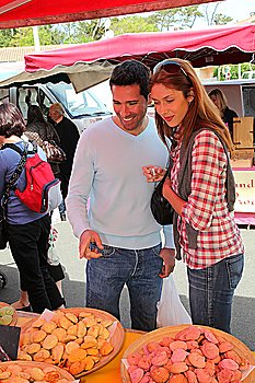 Couple shopping in outdoor market