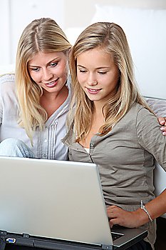 Woman and child surfing on internet