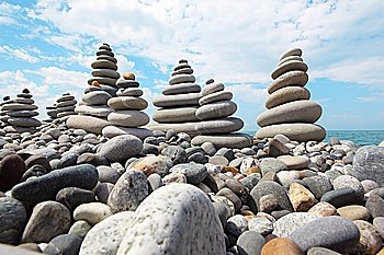 zen stones against sky, wide angle