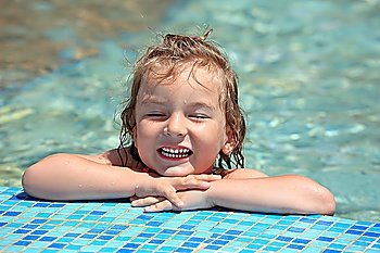 pretty little girl bathe in pool, closed eyes