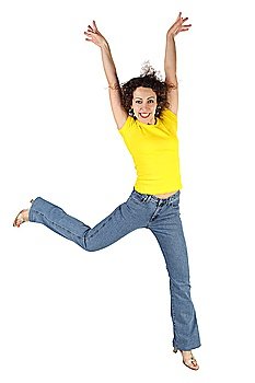 young attractive woman in yellow shirt and jeans jumping and smiling isolated on white