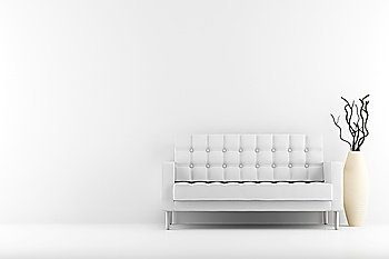 leather couch and vase with dry wood in front of white wall