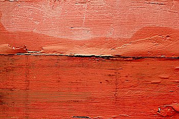 aged weathered wood painted in red orange color background texture