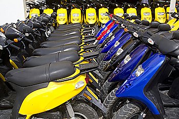 bikes motorbikes motorcycles rows in a renting shop