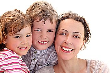 happy family with mother, daughter and son smiling and looking at camera, isolated on white