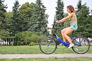 young woman on bicycle