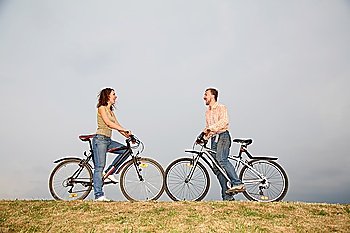 man and woman on the bicycles