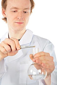 Chemist with tweezers and flask