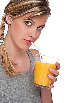 Woman drinking orange juice on white background