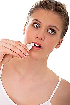 woman applying gloss on white background