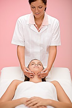 Body care - woman facial massage at day spa