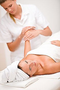 Body care - woman hand massage in day spa salon