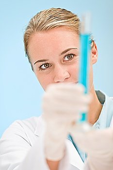 Flu virus experiment -  scientist in laboratory holding test tube