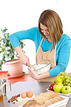 Baking - Smiling woman with healthy ingredients prepare organic dough