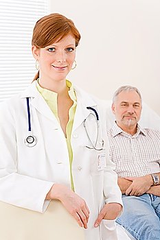 Doctor office - portrait female physician with senior patient