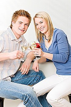 Celebration happy romantic couple enjoy white wine at home