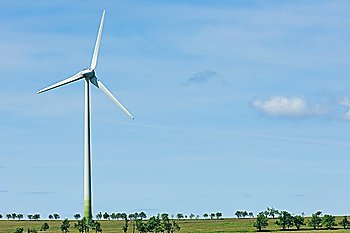 Green energy windmill generators ecology countryside blue sky