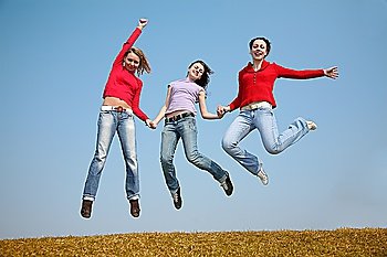 three jumping girls