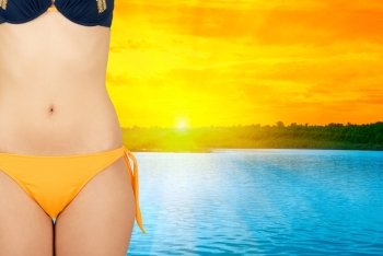 Girl at bikini closeup on water background