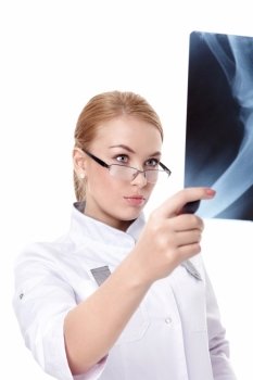 The young doctor with x-rays on a white background